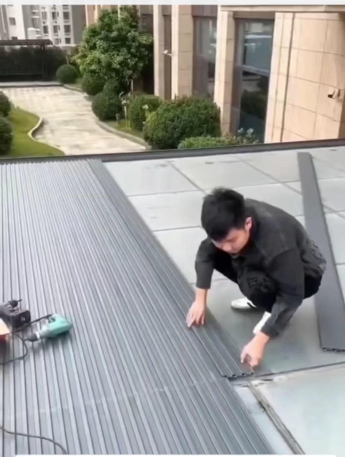 长城板雨棚安装现场